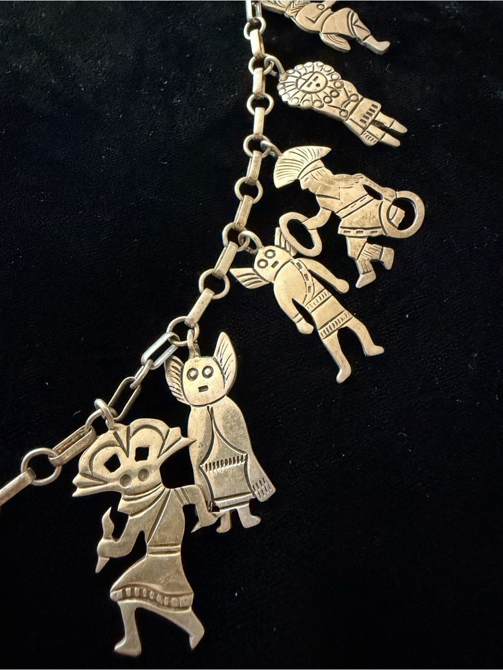Sterling silver necklace with 15 sterling kachina figures